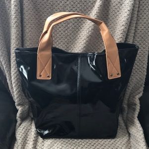 Large black purse with tan handles